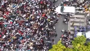 Gen Z protesters marching in India during anti-government demonstrations demanding education reforms and jobs.