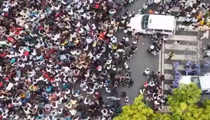 Gen Z protesters marching in India during anti-government demonstrations demanding education reforms and jobs.