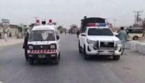 Security officials at the scene of the firing attack in Mastung where Session Judge Abdul Hakeem Kakar and his guard were killed.