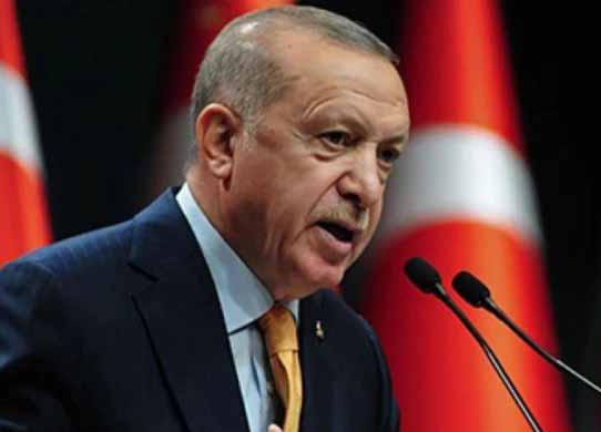 Turkish President Recep Tayyip Erdogan delivering a speech at the NATO Summit, emphasizing unity and cooperation among allied nations.