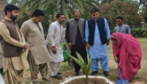 Lasbela Commissioner Saira Atta planting a sapling to inaugurate the Monsoon Tree Plantation Campaign 2026 in Hub, Balochistan.