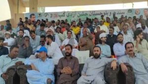 Players in action during the Sindh Balochistan Independence Cup 2026 football tournament at Baba-e-Bizenjo Football Stadium in Gwadar.